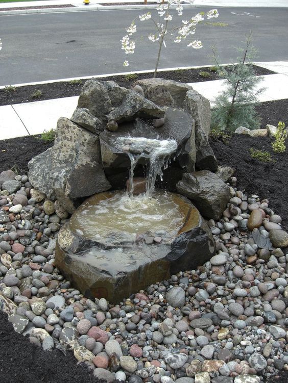 cheap simple front yard landscaping ideas with a DIY fountain